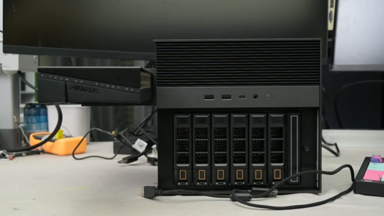 Crazed modder turns NAS into a gaming PC with RTX 5060 hanging from the side, boosts frame rate by 828% — Frankenstein rig hides dedicated PSU in drive bay, breaks Time Spy world record for the onboard CPU Crazed modder turns NAS into a gaming PC with RTX 5060 hanging from the side, boosts frame rate by 828% — Frankenstein rig hides dedicated PSU in drive bay, breaks Time Spy world record for the onboard CPU