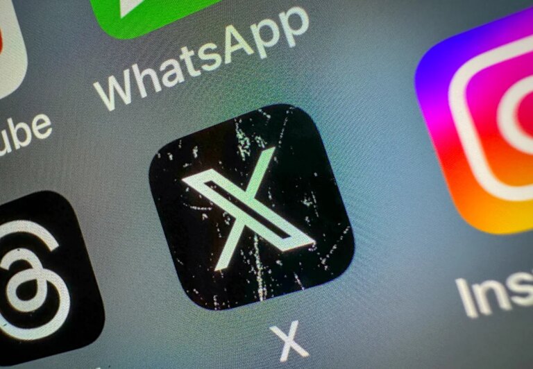 X replaces ‘misaligned’ revenue sharing program with Original Content Rewards X icon on a smartphone screen