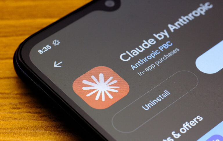 Photo of phone with Claude by Anthropic icon showing