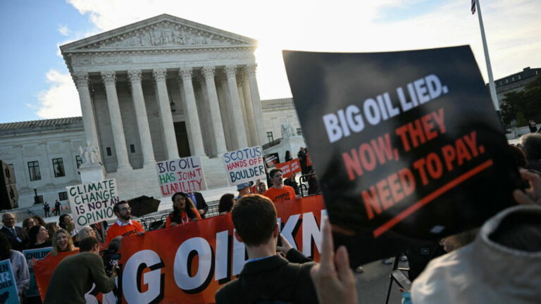 Big Oil asks Supreme Court to kill climate lawsuits before trial Protestors outside the Supreme Court