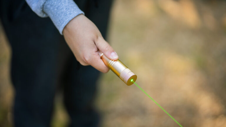 Why Laser Pointer Beams Disappear When You Point Them At A TV Screen